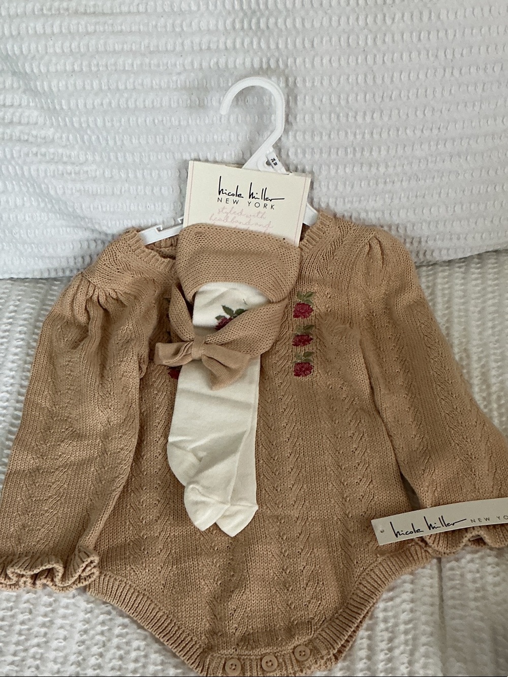 Nicole Miller Tan Knit Baby Romper with Cream Bow and Pink Floral Accents